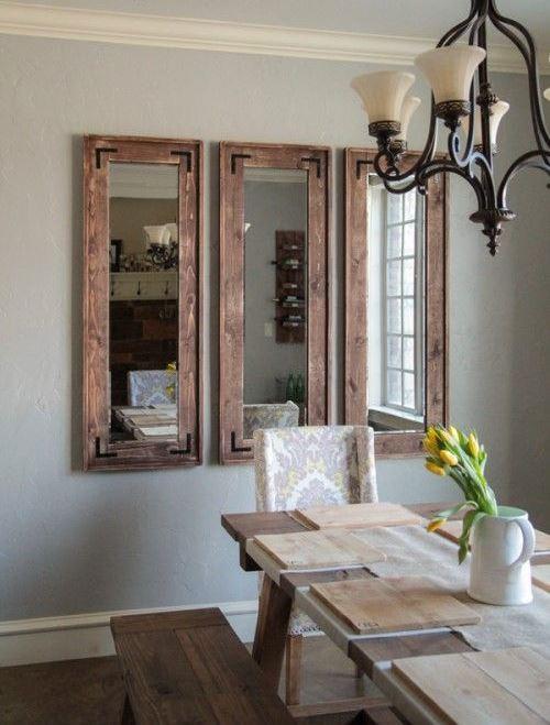 Sala de jantar com espelho com estilo rústico